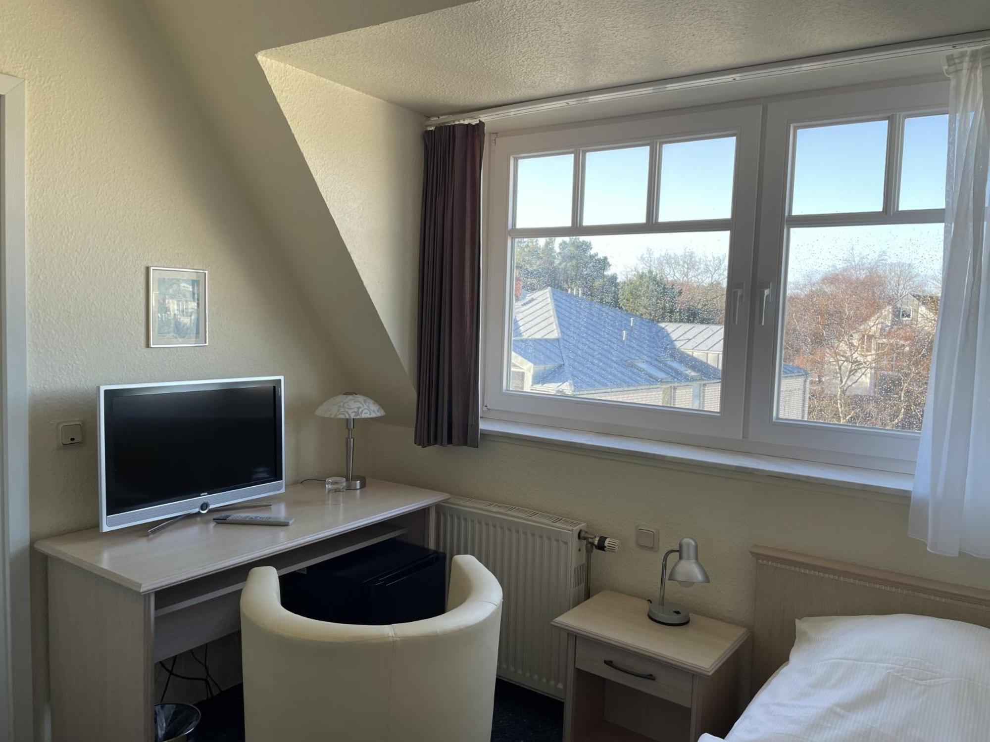 Strandhotel Duenenhaus Юлиусрух Екстериор снимка